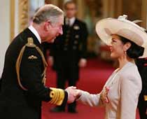 Catherine Zeta-Jones Gets Knighted By Prince Charles