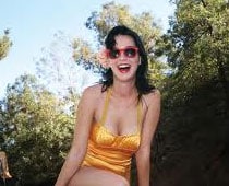 Katy Perry likes her 'enormous bust'