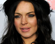  Lindsay Lohan Sued Over Tanning Bill