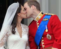 William, Kate Exchange Kisses On Balcony