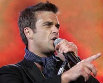 Robbie Williams Takes Yoga Lessons To Stay Positive
