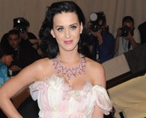 Katy Perry struck down with food poisoning