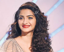 Sonam has a tongue piercing, two tattoos