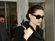 Angelina Jolie uses handcuffs