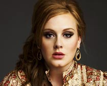 Adele scores two most-played songs in UK