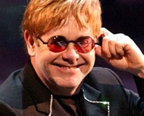 Singer Elton John turns author