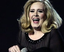Big winner Adele flips the bird at Brit Music Awards