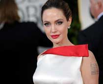   Jolie prefers real world over glitz and glamour