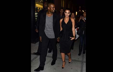Kim Kardashian and Kanye West walk hand-in-hand again