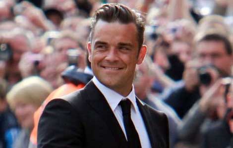 Robbie Williams can't stop crying over baby
