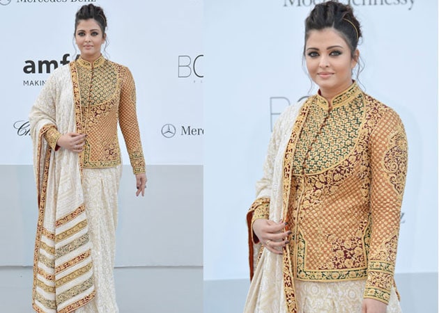 Ash covers up in designer sari at Cannes
