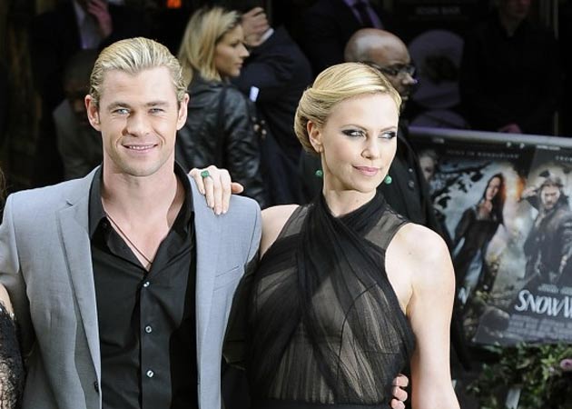 Charlize Theron giving son's old clothes to Chris Hemsworth