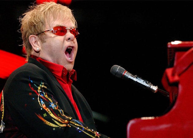 Elton John performs for astronauts