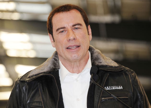John Travolta's first accuser dropped by attorney
