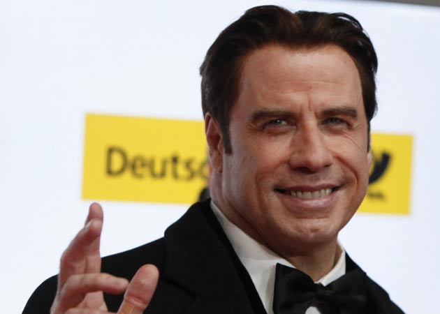 John Travolta's first accuser files papers to dismiss sexual assault case