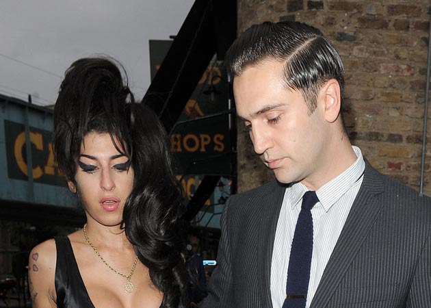 Amy Winehouse's boyfriend Reg Traviss charged with rape