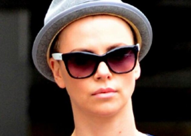 Charlize Theron shaves off hair into a short crop