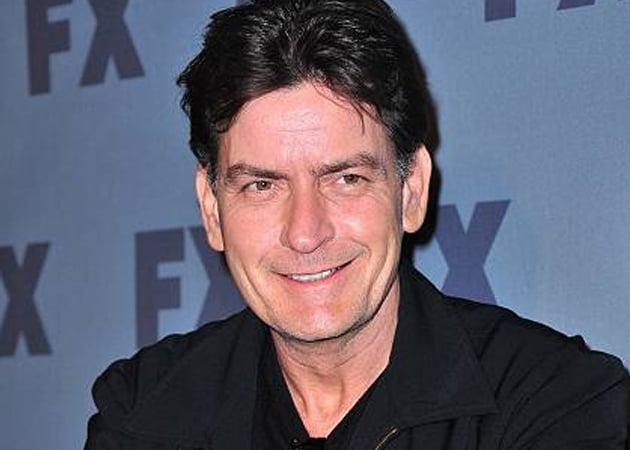 Charlie Sheen admits he was "hurting himself" with his wild behaviour