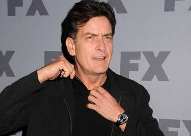 Charlie Sheen partying with scantily clad girls