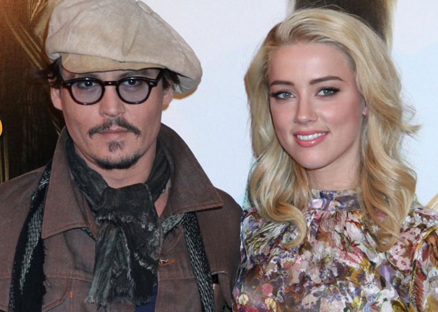 Johnny Depp and Amber Heard are "100 per cent dating"