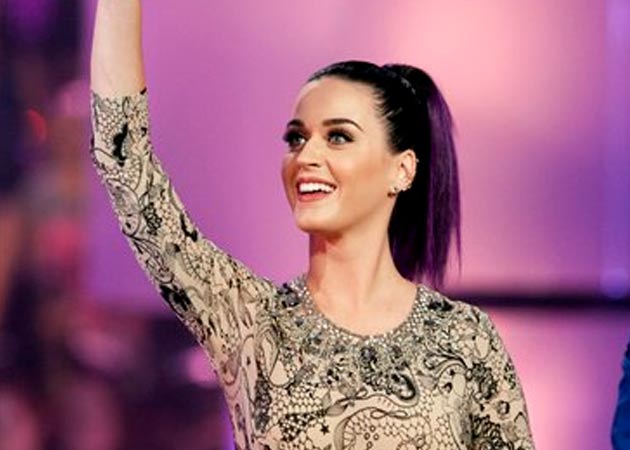 Katy Perry says she believes in love and marriage