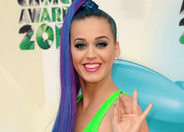 Drunk Katy Perry had to be helped out of Justin Bieber's bash 