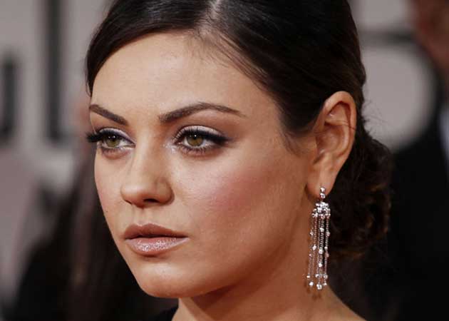 Mila Kunis doesn't think she is attractive