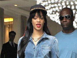 Rihanna's bodyguard punches photographer Rihanna's bodyguard punches photographer