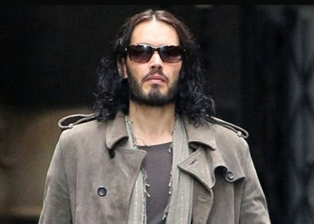 Russell Brand thinks he deserves a knighthood