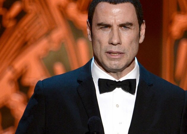 Writer sues John Travolta for destroying his credibility