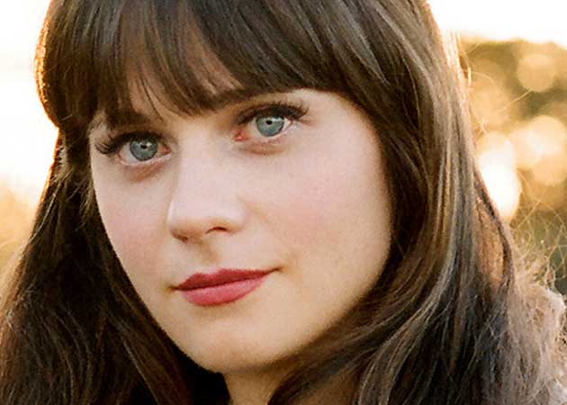 Zooey Deschanel likes intelligent men who make her laugh