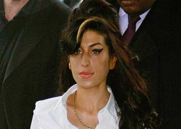 Amy Winehouse's parents broke down in tears as they visited her house