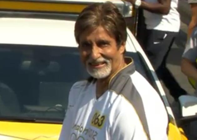 Amitabh Bachchan carries London Olympic torch