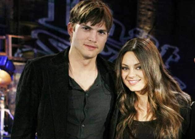 Mila Kunis living with Ashton Kutcher?