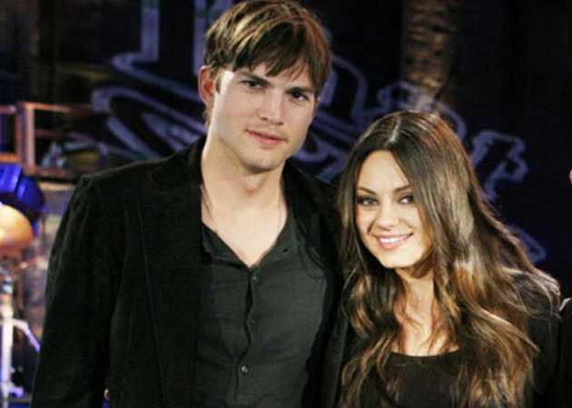 Mila Kunis living with Ashton Kutcher?