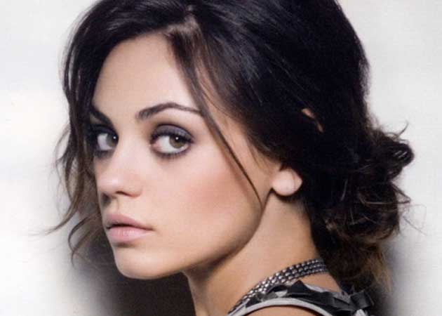 Mila Kunis didn't feel like a girl until she had her first crush