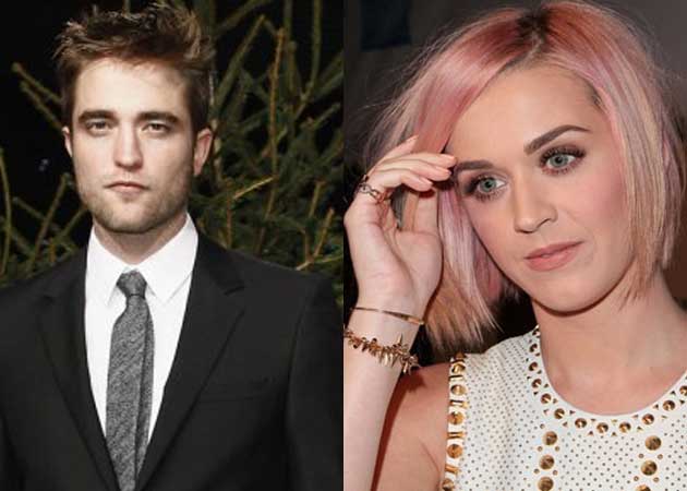 Robert Pattinson is being comforted by friend Katy Perry