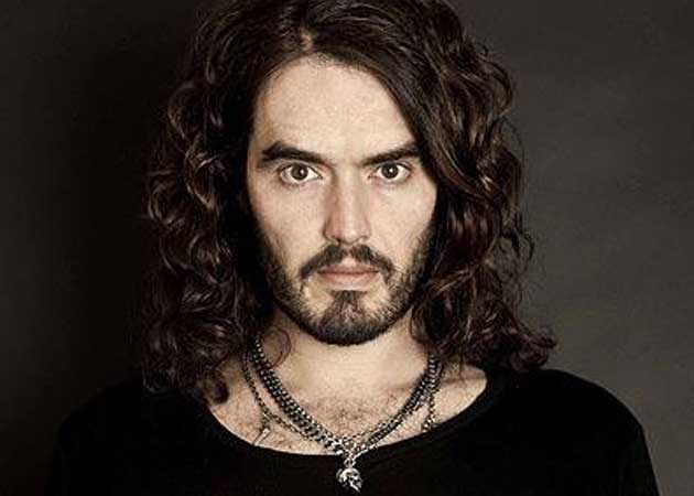 Russell Brand will be charged for throwing a photographer's iPhone through a window