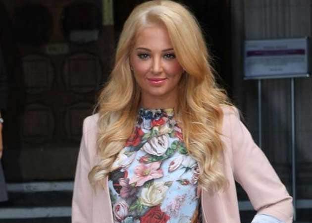 Tulisa goes to Ibiza to celebrate birthday and sex tape win