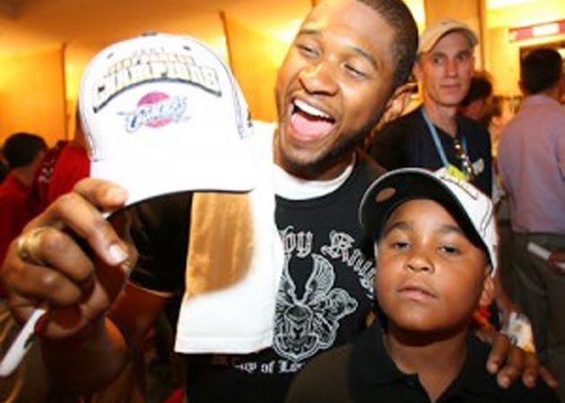 Usher's "completely devastated" after stepson declared brain dead