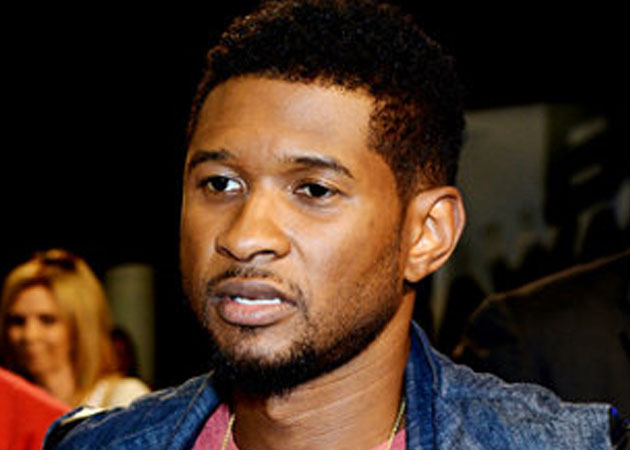 Usher is "standing strong" after death of stepson Kyle 