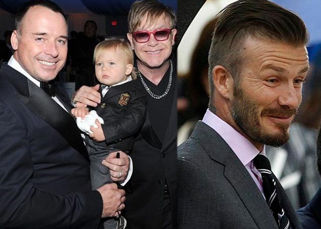 Sir Elton John wants David Beckham to teach his son Zachary how to play soccer