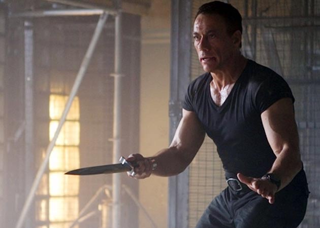 Jean-Claude Van Damme was "honoured" to get his "ass kicked" in <i>The Expendables 2</i>