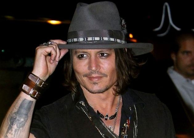 Johnny Depp performs with Aerosmith