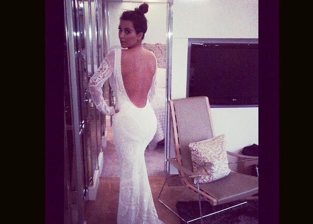 Kim Kardashian sparks wedding rumours with Kanye West, tweets photo in wedding gown