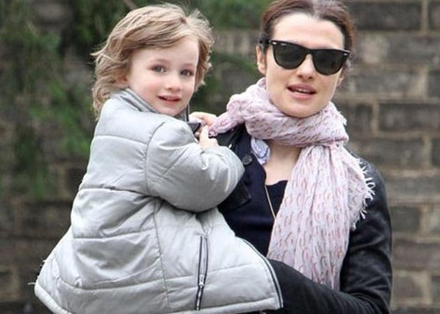 Rachel Weisz expects her son to "rebel" and become a banker