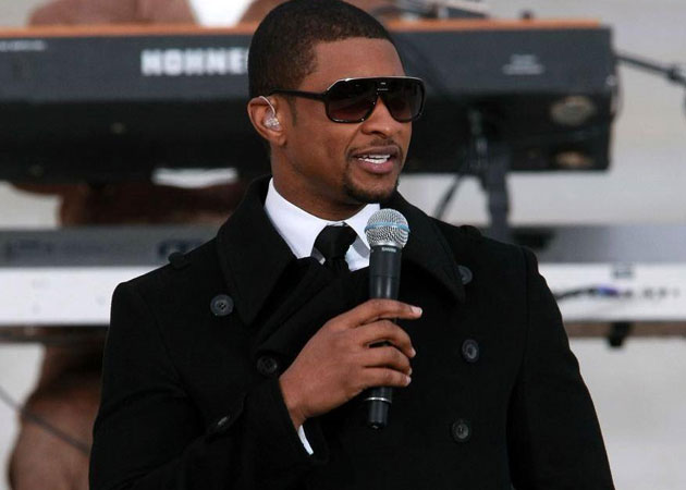 Rapper Usher returns to stage after son's death