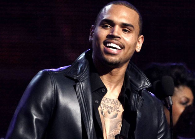 Chris Brown meets domestic violence victims