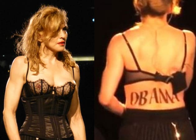 Madonna shows off Obama tattoo at a concert