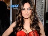 Mila Kunis rescued by firefighters